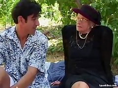 Horny granny went to the nature with her younger lover and had wild sex with him