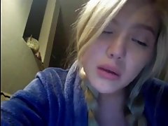 German blonde with long hair, Magy is rubbing her pussy in front of her web cam