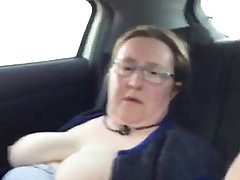 Fat woman is about to get her pussy fingered in the car, while no one is watching