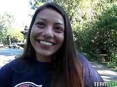 Pretty teen has a huge smile on her face as she is getting ready to suck a huge dick