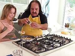 Ron Jeremy is fucking Lilly Ford in the kitchen, instead of making lunch with her