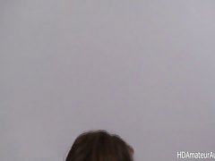 Cute teen is taking a shower while her partner is making a video of her