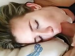 Horny girl is lying on the bed and rubbing her wet pussy, while her man is watching