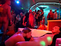 Horny men and women are doing it in the night club and enjoying it a lot
