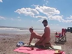 Naughty blonde girl likes to fuck and suck a horny stranger on the beautiful beach