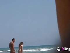 Horny couple is having sex on a nudist beach in Mykonos and enjoying it a lot