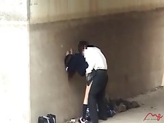 Dark haired, Asian schoolgirl is getting banged in a public place, in the middle of the day